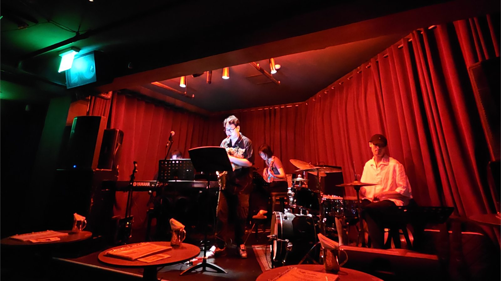 PCY Group performing jazz-funk on the red-lit stage at Subriot HBC in Haebangchon